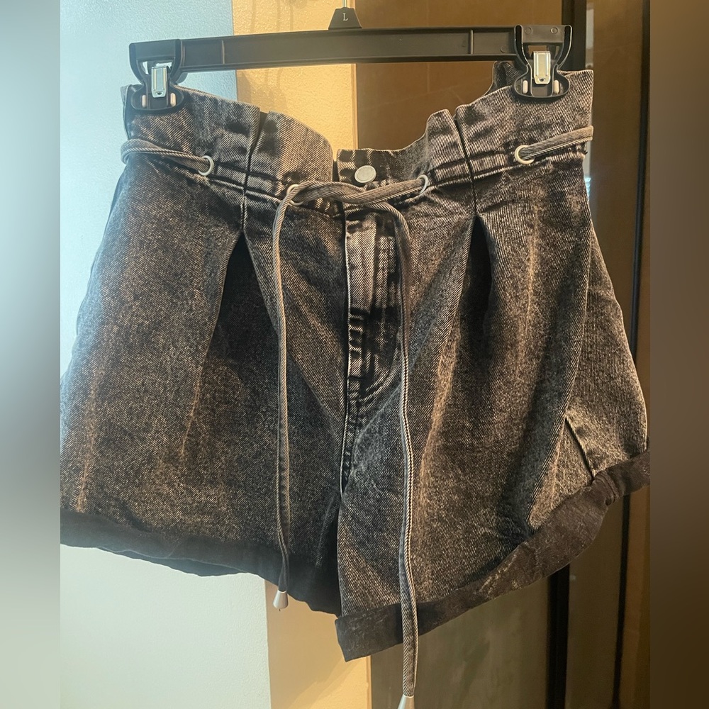 Paper-bag, drawstring denim shorts for sale.